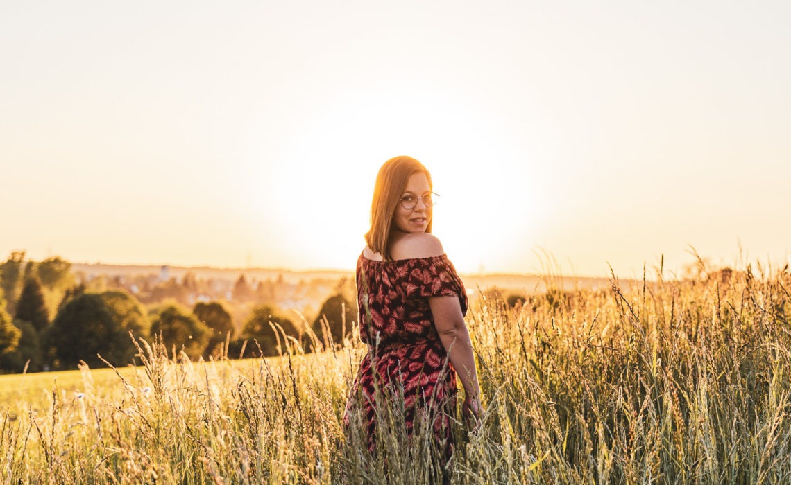 Sunset Girl in the Grassland